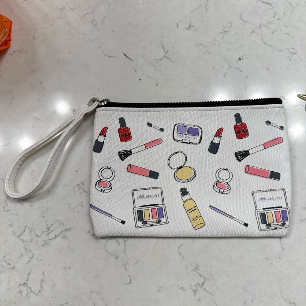 White Makeup Print Wristlet